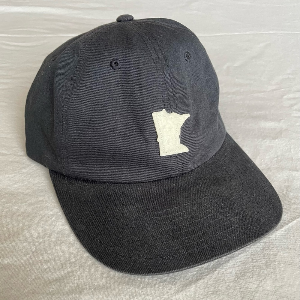 Minnesota state black dad hat.